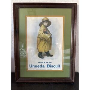 Vintage Antique Framed Ad for Uneeda Bisquits (Early Nabisco) Boy in Yellow Rain